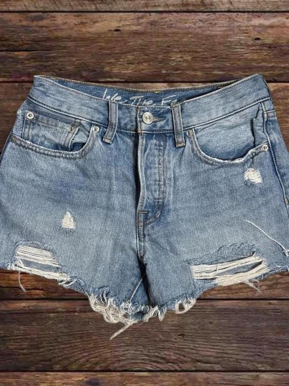 We The Free Faded Light Blue Distressed Denim Cutoff Shorts